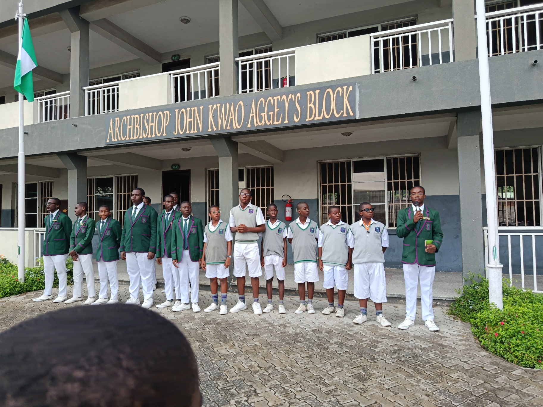Students standing in front of the Archbishop John Kwao Aggey's Block