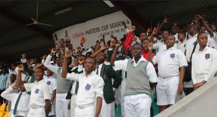 St. Gregory's College supporters in the stands at a sports event